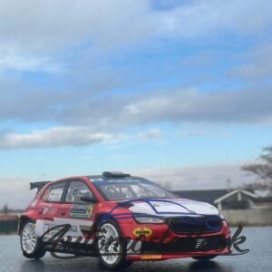 Model auta rally Škoda Fabia Rally2 - Rallye Monte Carlo 2024, No.38, Locatelli - Tiraboschi. Mierka 1:43. IXO Models. Balenie model je na podstavci vo vitríne s papierovým prebalom.