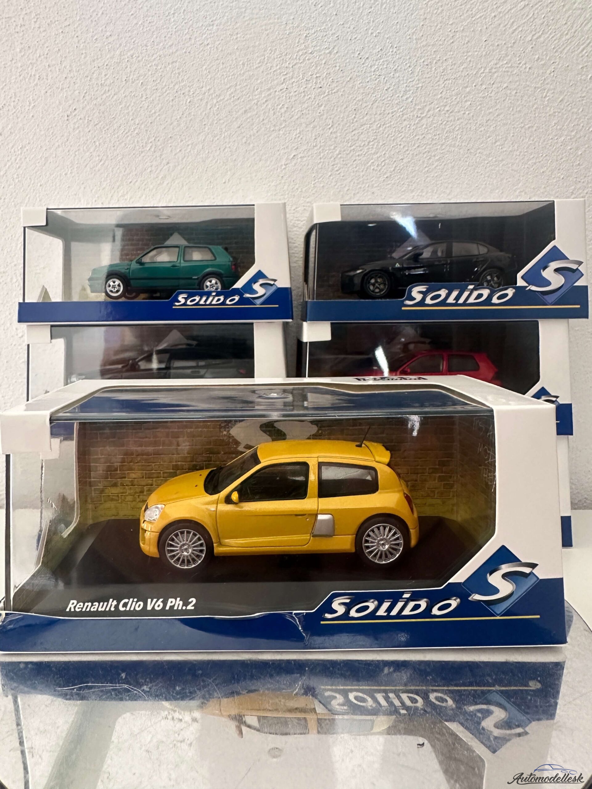 Model auta Renault Clio V6 PH.2 Jaune Sirius, 2003 Model auta Renault Clio V6 PH.2 Jaune Sirius, 2003