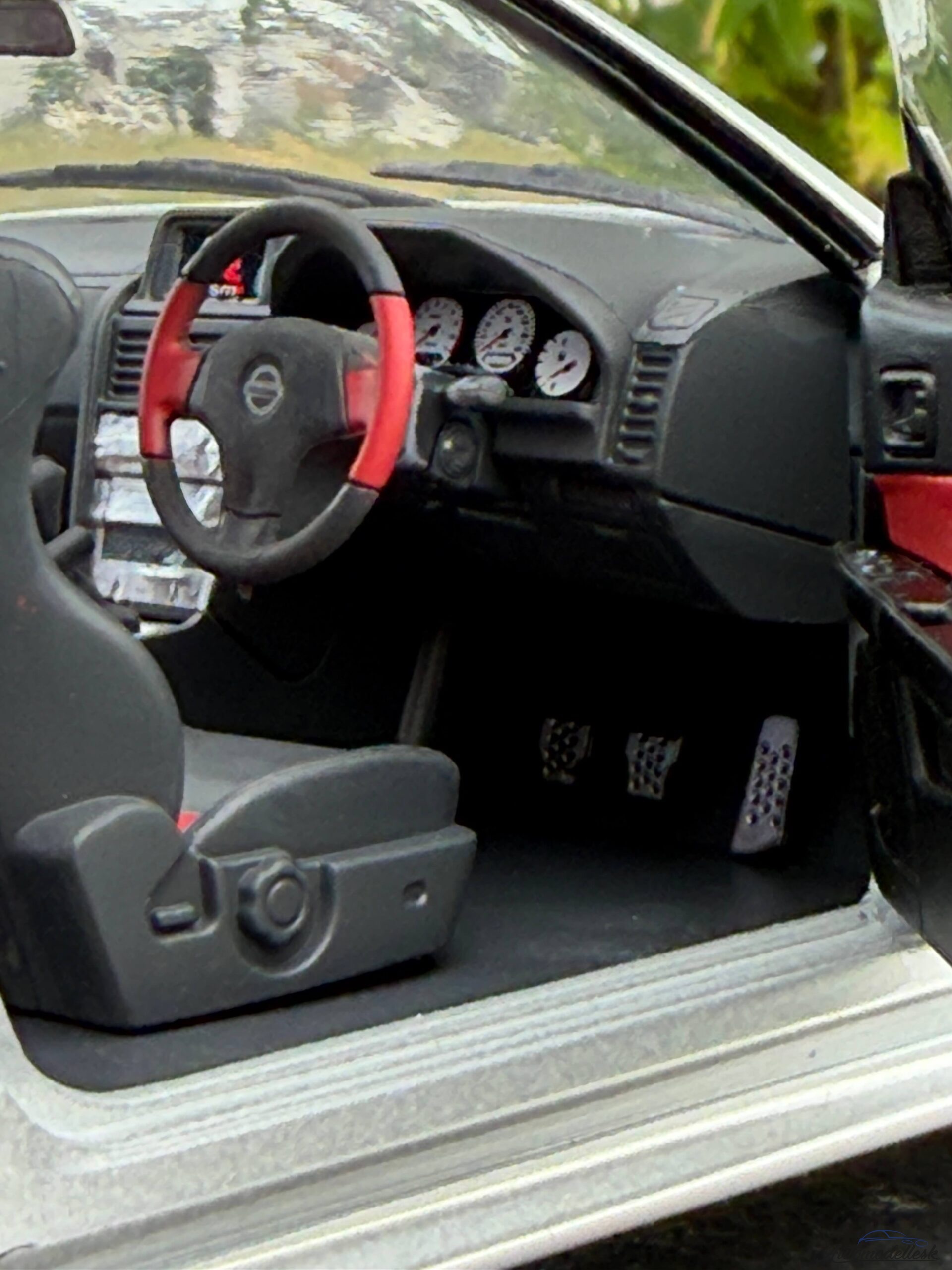 Model auta NISSAN SKYLINE GT-R (BNR34) WITH NISMO PARTS SILVER 1999 Model auta NISSAN SKYLINE GT-R (BNR34) WITH NISMO PARTS SILVER 1999