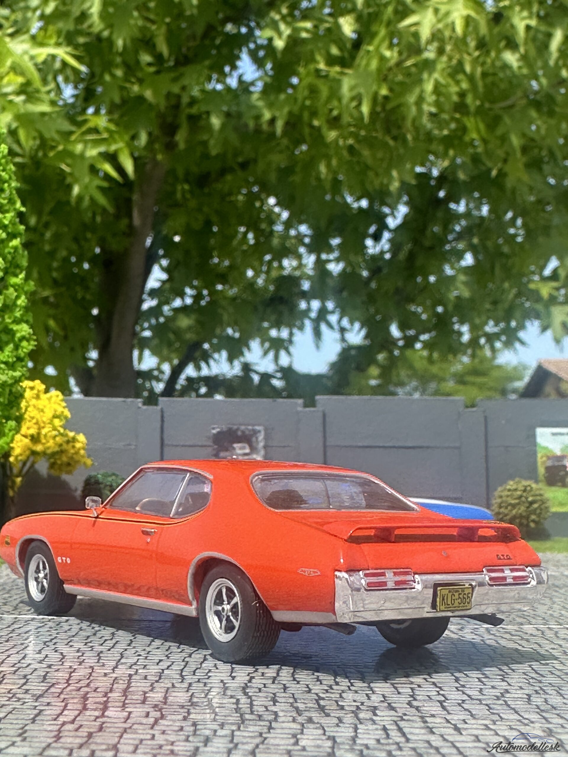 Model auta Pontiac GTO *The Judge*, červená, 1969 Model auta Pontiac GTO *The Judge*, červená, 1969